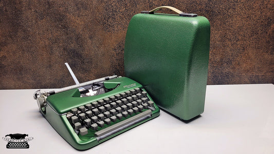 Vintage Olympia Splendid 33/66 Crystal Green Typewriter - A Classic Tool for Typing Enthusiasts and Analog Technology Fans