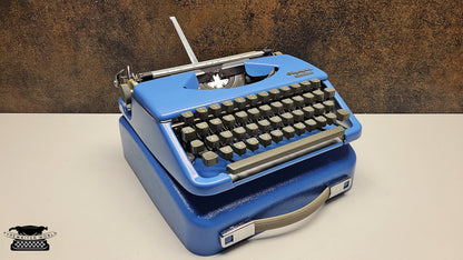 Vintage Olympia Splendid 33/66 Vintage Blue Typewriter - The Perfect Writing Tool for Authors and Collectors