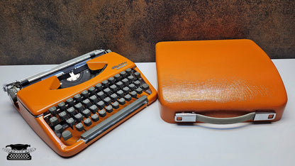 Vintage Olympia Splendid 33/66 Vintage Orange Typewriter - A Unique Crafting Tool for Scrapbookers and DIY Enthusiasts