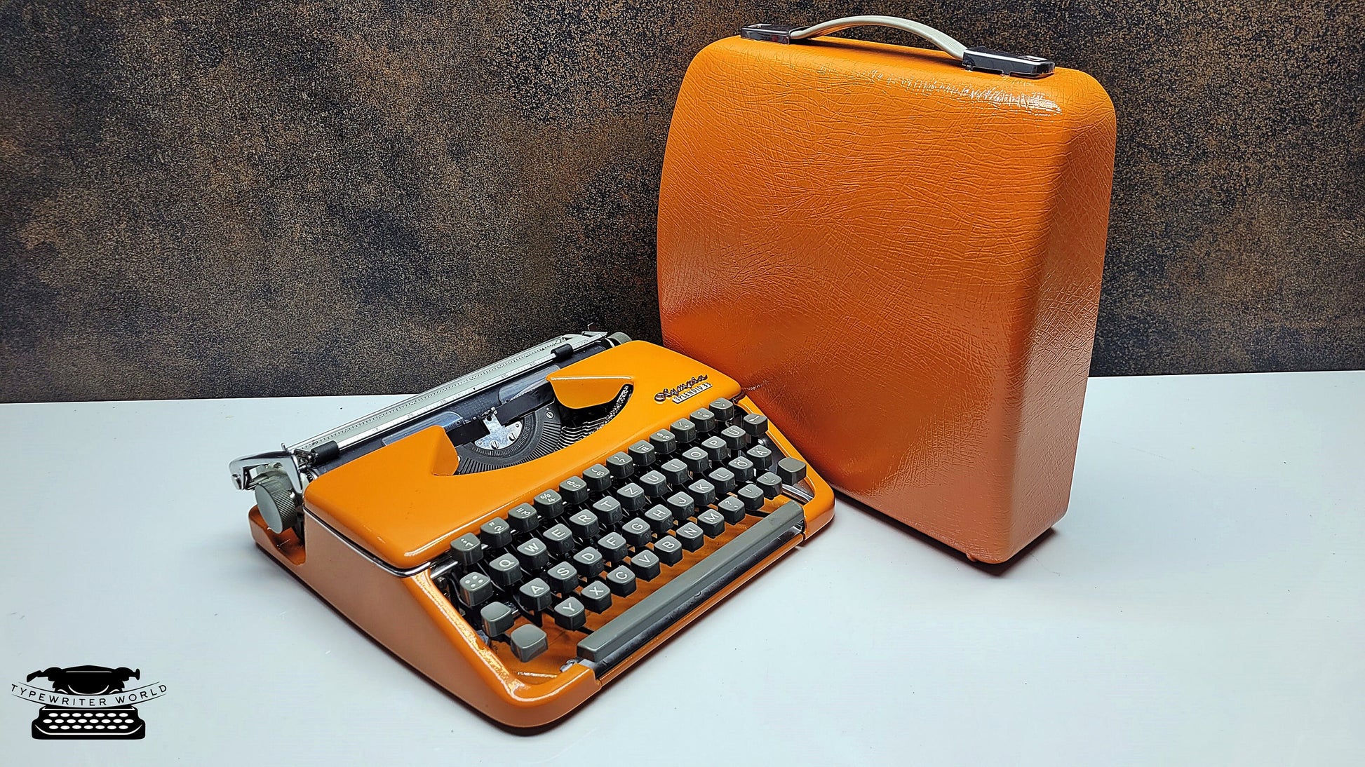 Vintage Olympia Splendid 33/66 Vintage Orange Typewriter - A Unique Crafting Tool for Scrapbookers and DIY Enthusiasts