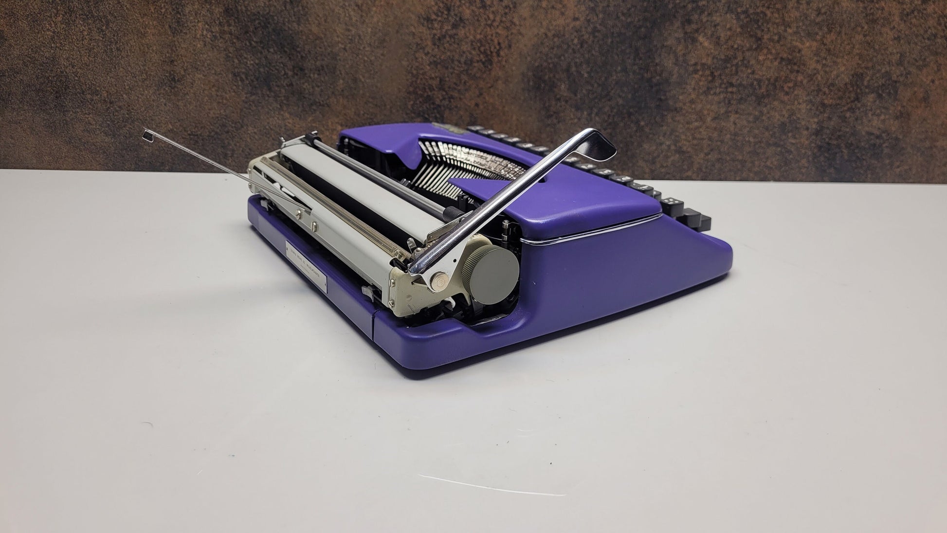 Vintage Olympia Splendid 33/66 Purple Typewriter with Grey Keyboard - A Unique Tool for Typographic Designers