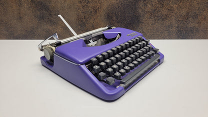 Vintage Olympia Splendid 33/66 Purple Typewriter with Grey Keyboard - A Unique Tool for Typographic Designers
