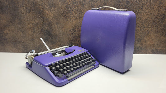 Vintage Olympia Splendid 33/66 Purple Typewriter with Grey Keyboard - A Unique Tool for Typographic Designers