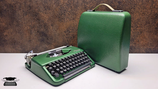 Rare Vintage Olympia Splendid 33/66 Crystal Typewriter with Black Keyboard - A Must-Have for Typewriter Enthusiasts and Historians