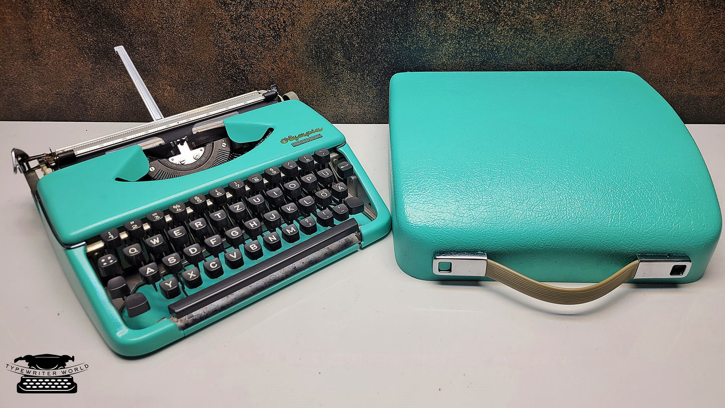 Olympia Splendid 33/66 Vintage Turquoise  Manual Typewriter with Black Keyboard - A Writing Tool for Journalists and Archivists