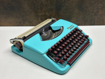 Antique Olympia Splendid 33/66 Turquoise Typewriter with Matching Case and Burgundy Keys | Rare Mechanical Keyboard for Writers and Collecto