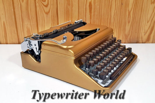 Gold Triumph Typewriter | Antique & Fully Operational